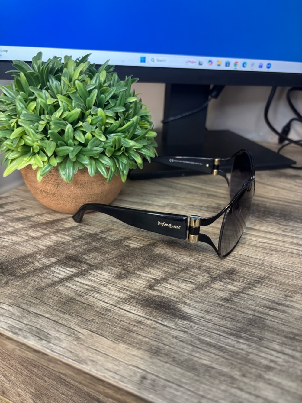 Yves Saint Laurent Black Sunglasses with Gold Trim